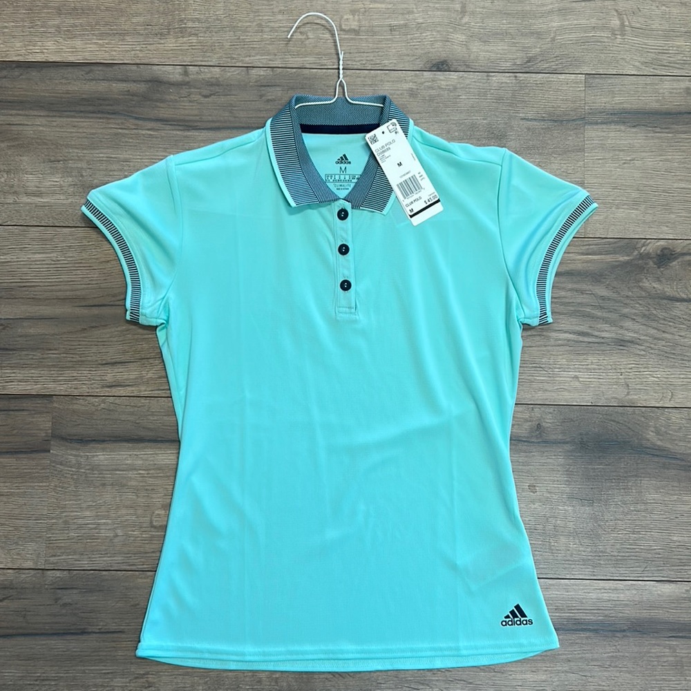 Adidas golf shirt.  Women’s size M.